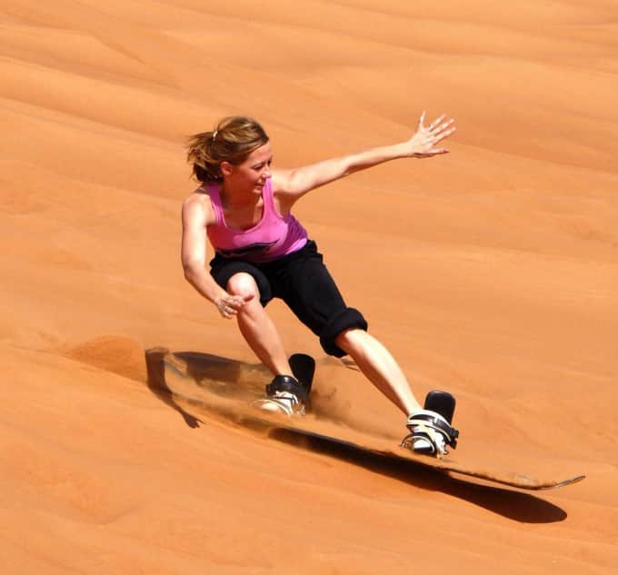 sandboarding-woman-girl