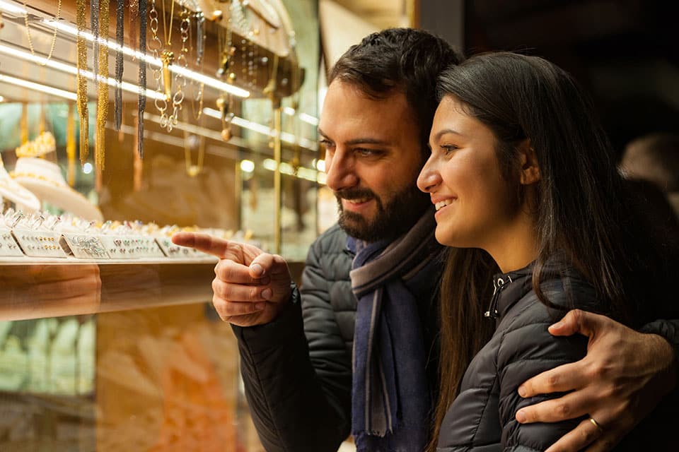 Couple looking at jewelry