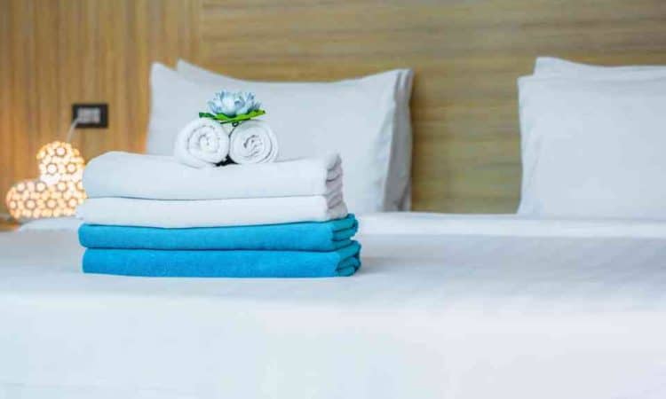 Clean bed with towels